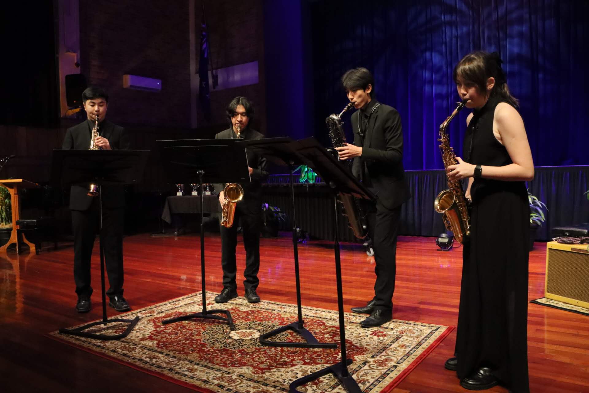 Simple Solutions saxophone quartet performing together